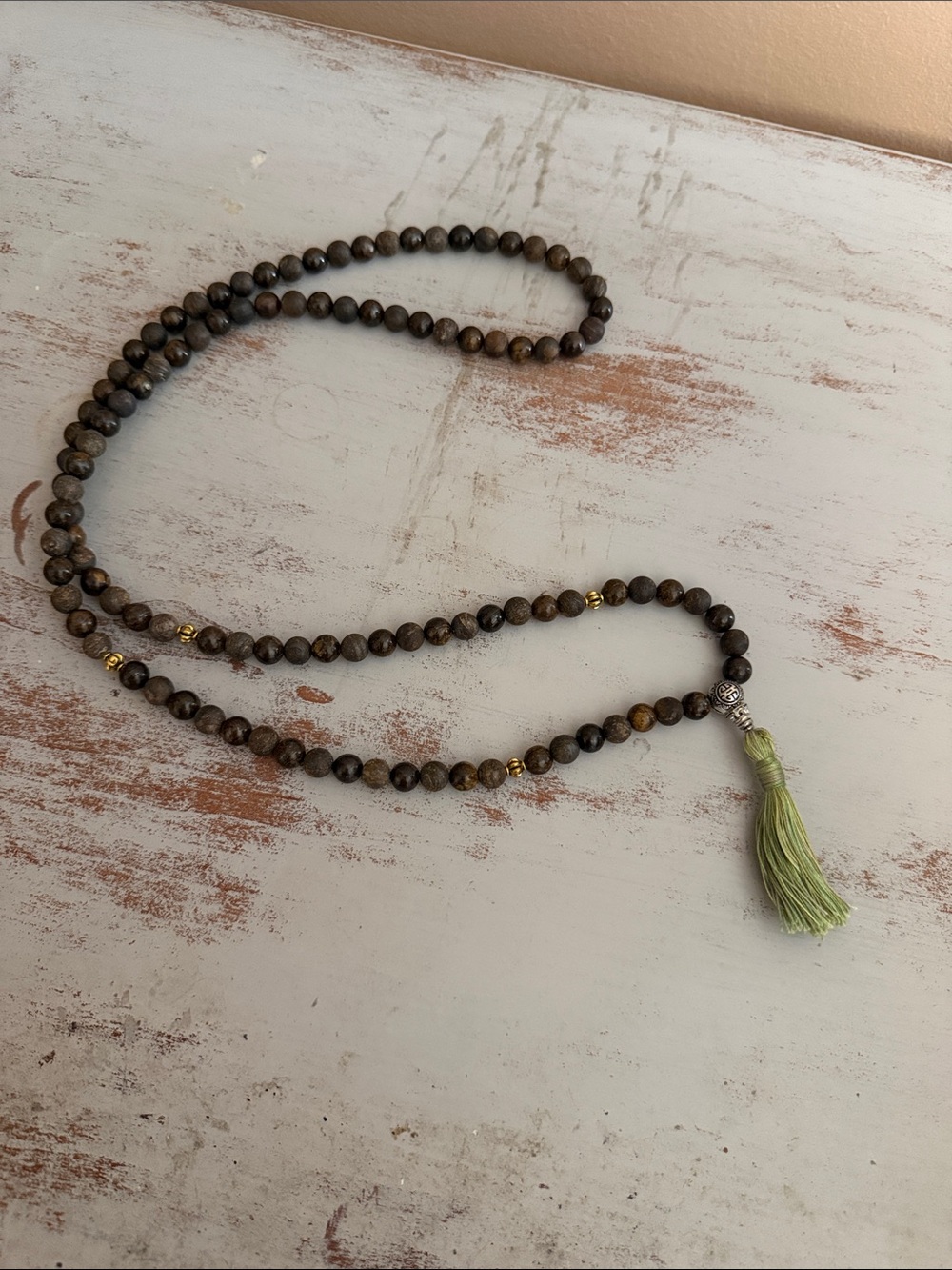 Brown Beaded Mala Necklace with Light Green Tassel and Gold Accents